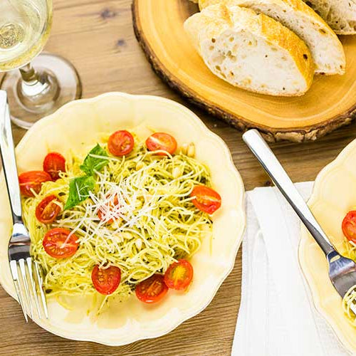 Homemade angel hair pasta with pesto sauce