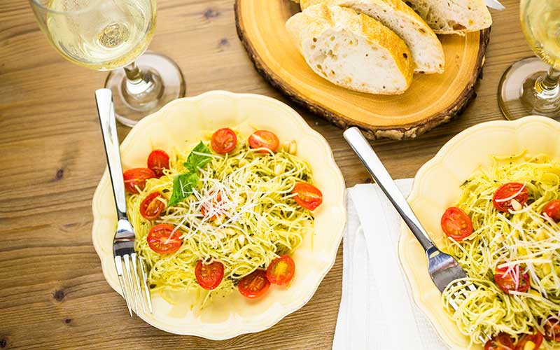 Homemade angel hair pasta with pesto sauce